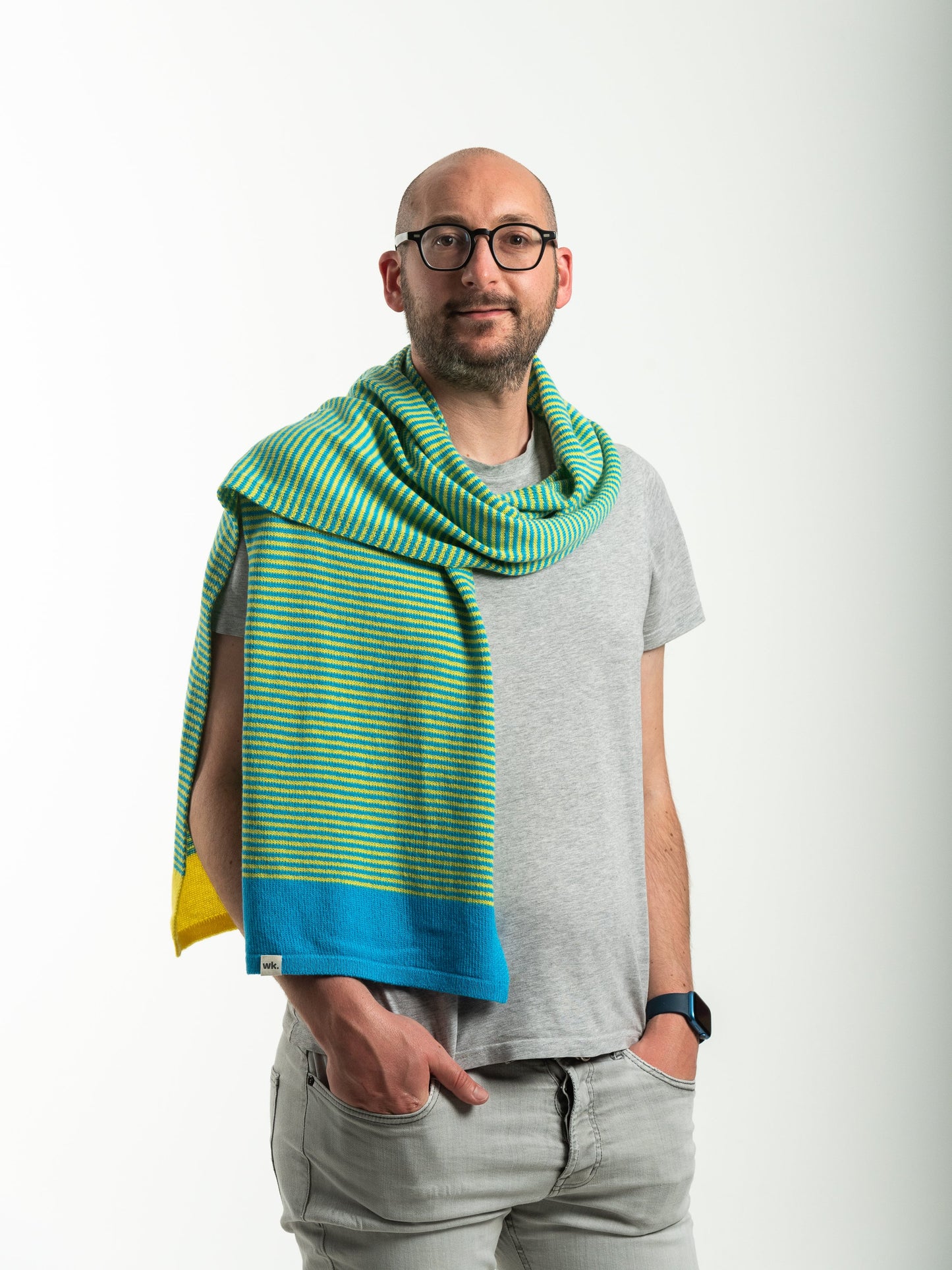 man wearing merino wool yellow and blue stripe scarf - Woolkind