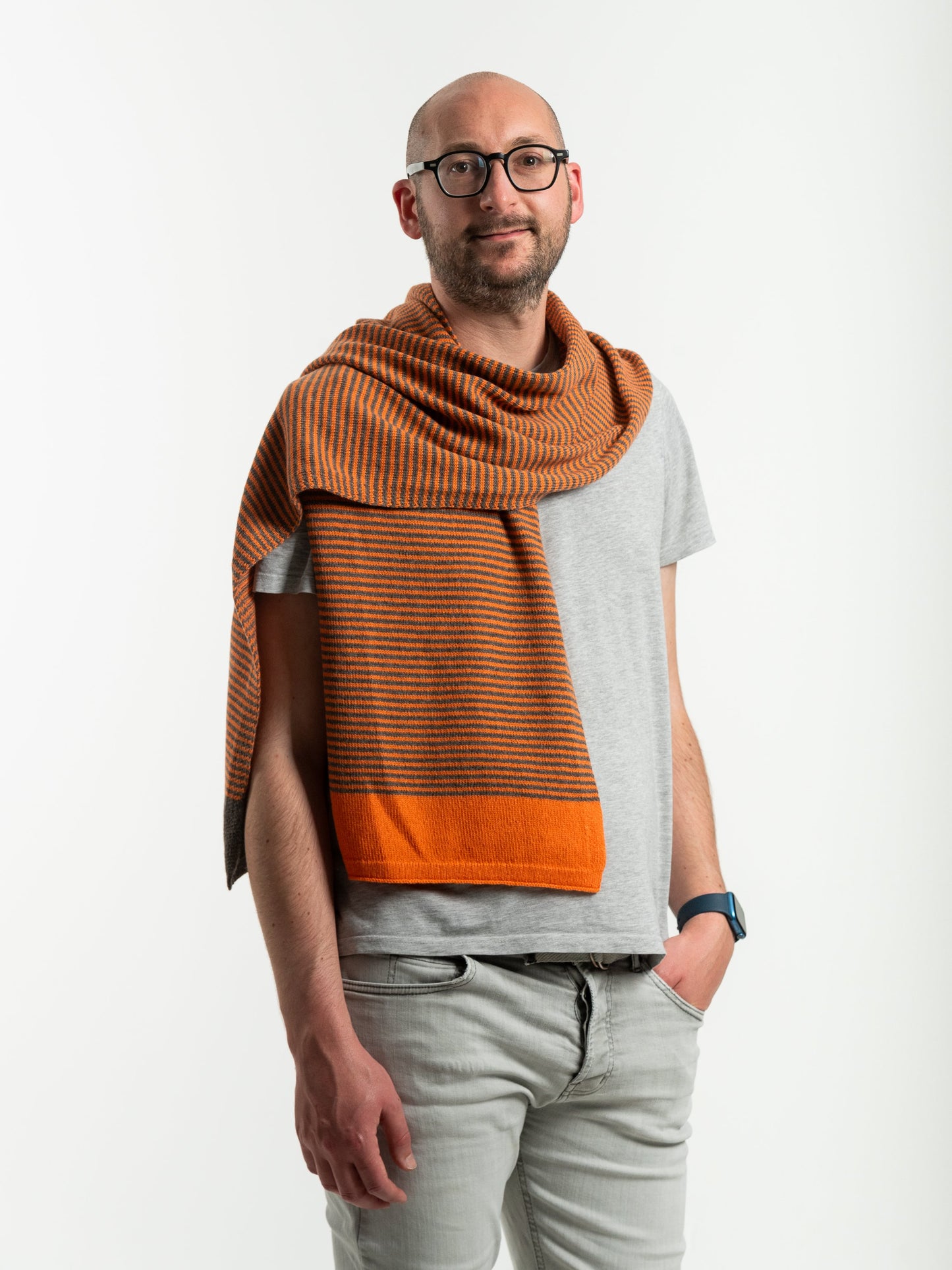 woman wearing merino wool orange and brown stripe scarf - Woolkind