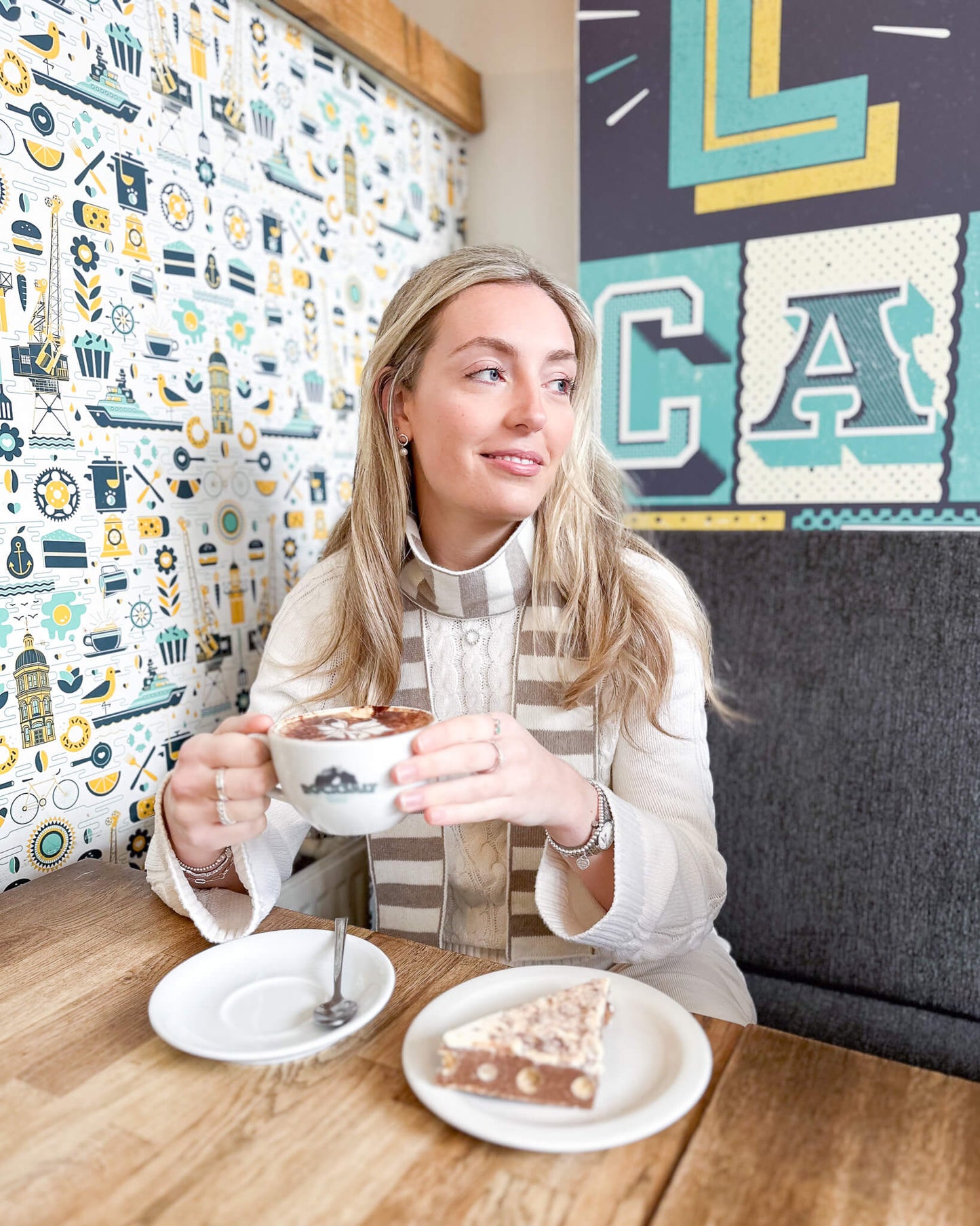 white woman wearing beige and cream skinny merino wool stripe scarf - Woolkind