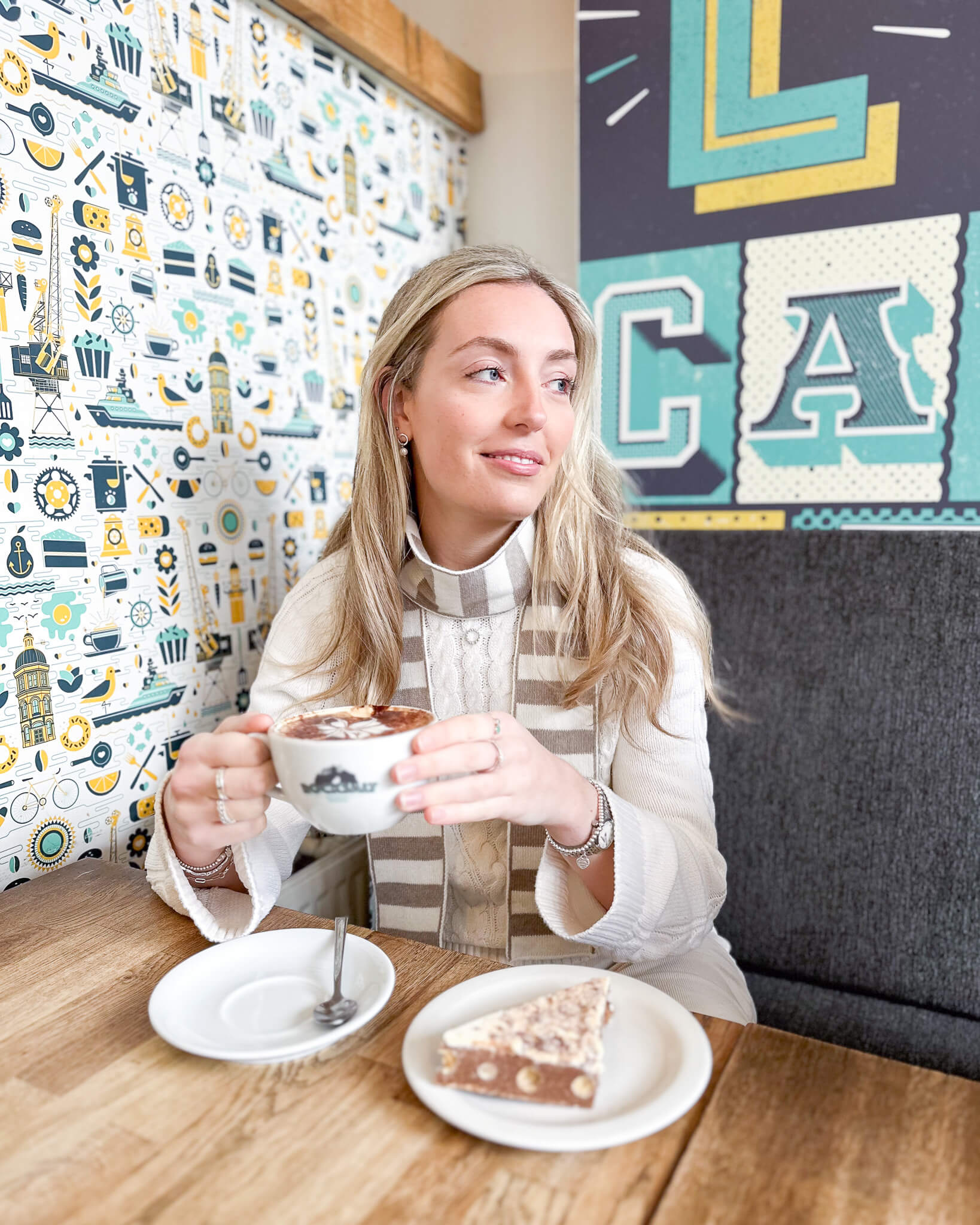 white woman wearing beige and cream skinny merino wool stripe scarf - Woolkind