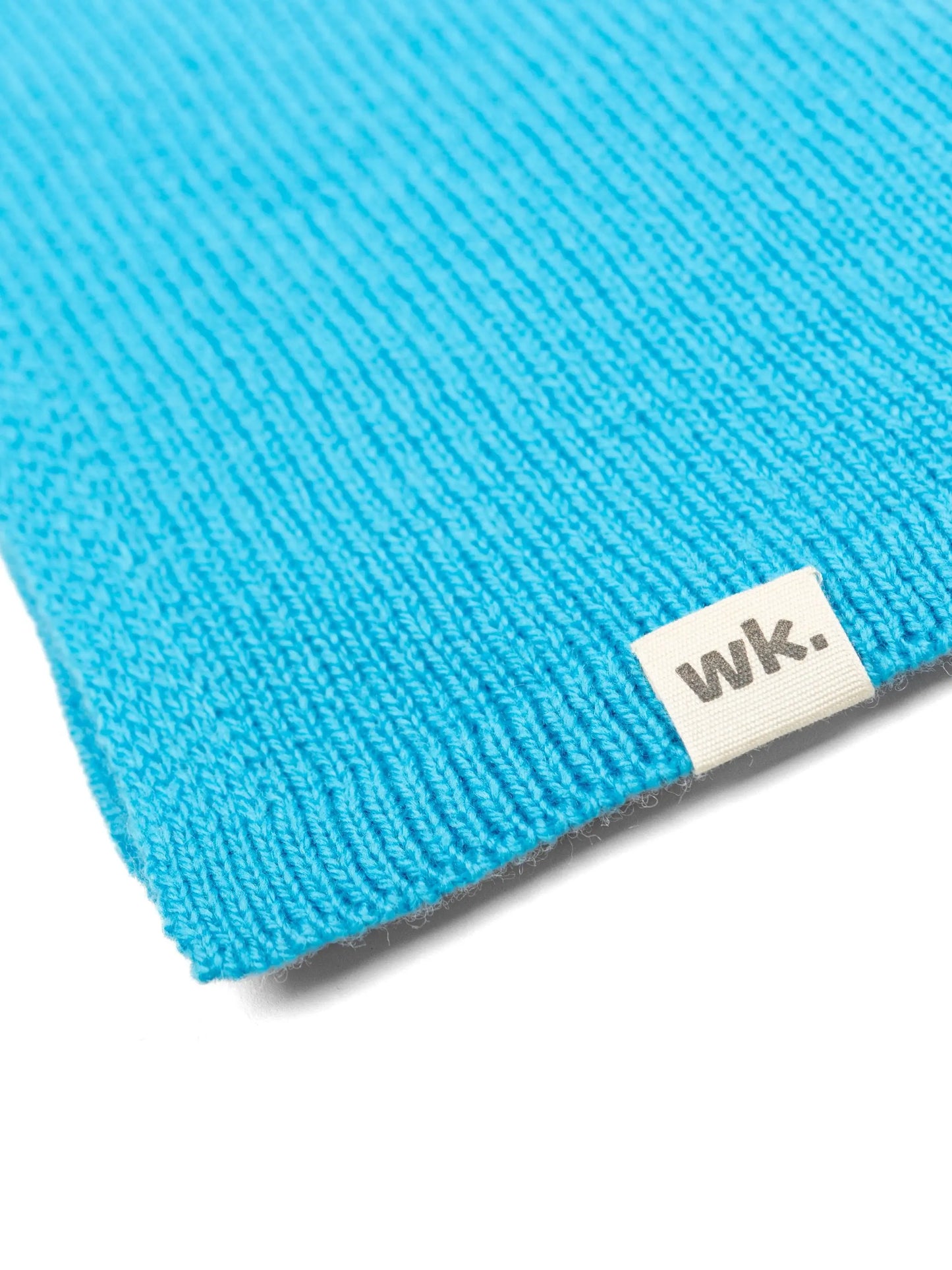 corner of a lightweight quality blue merino wool scarf - woolkind