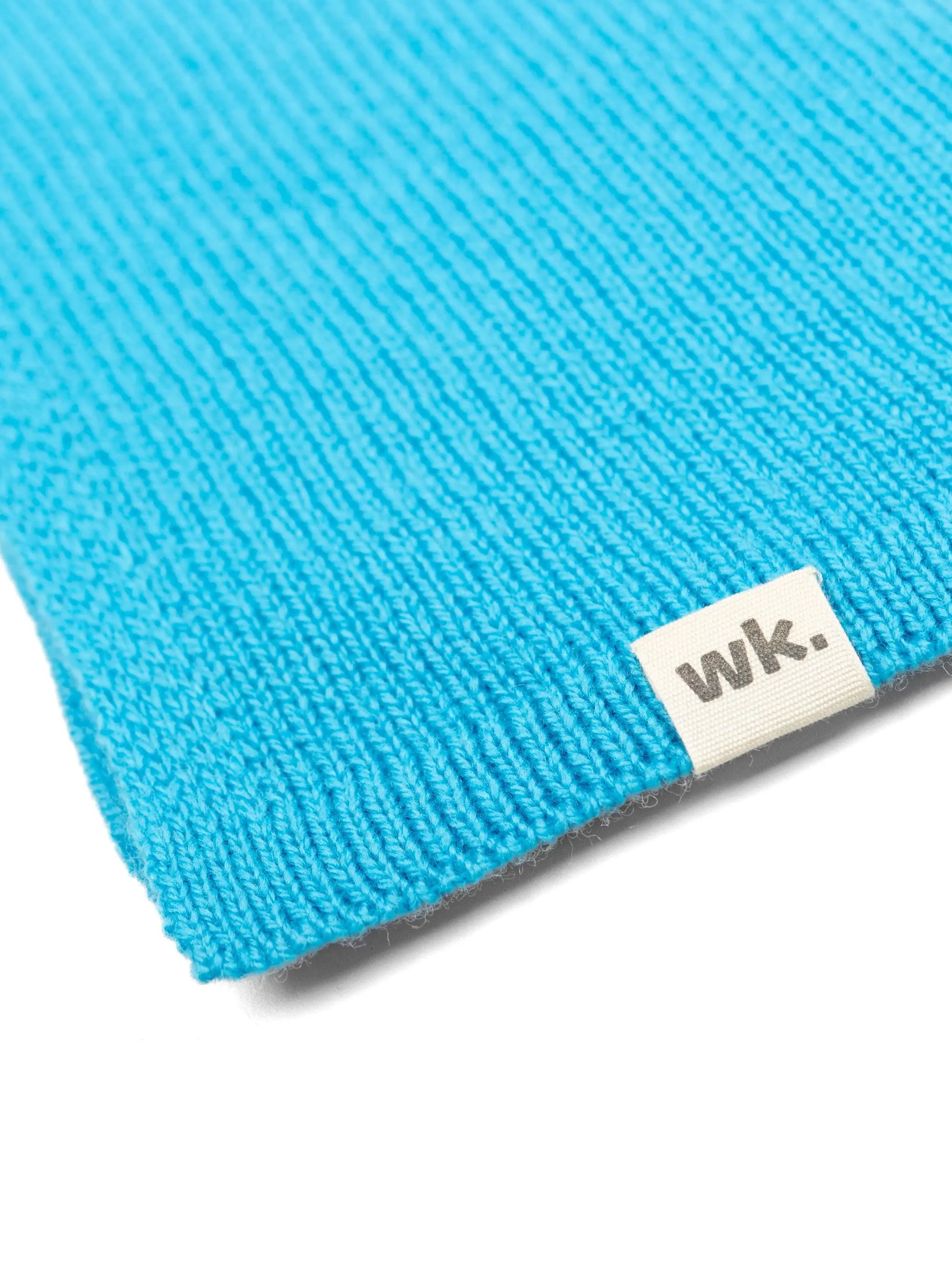 corner of a lightweight quality blue merino wool scarf - woolkind