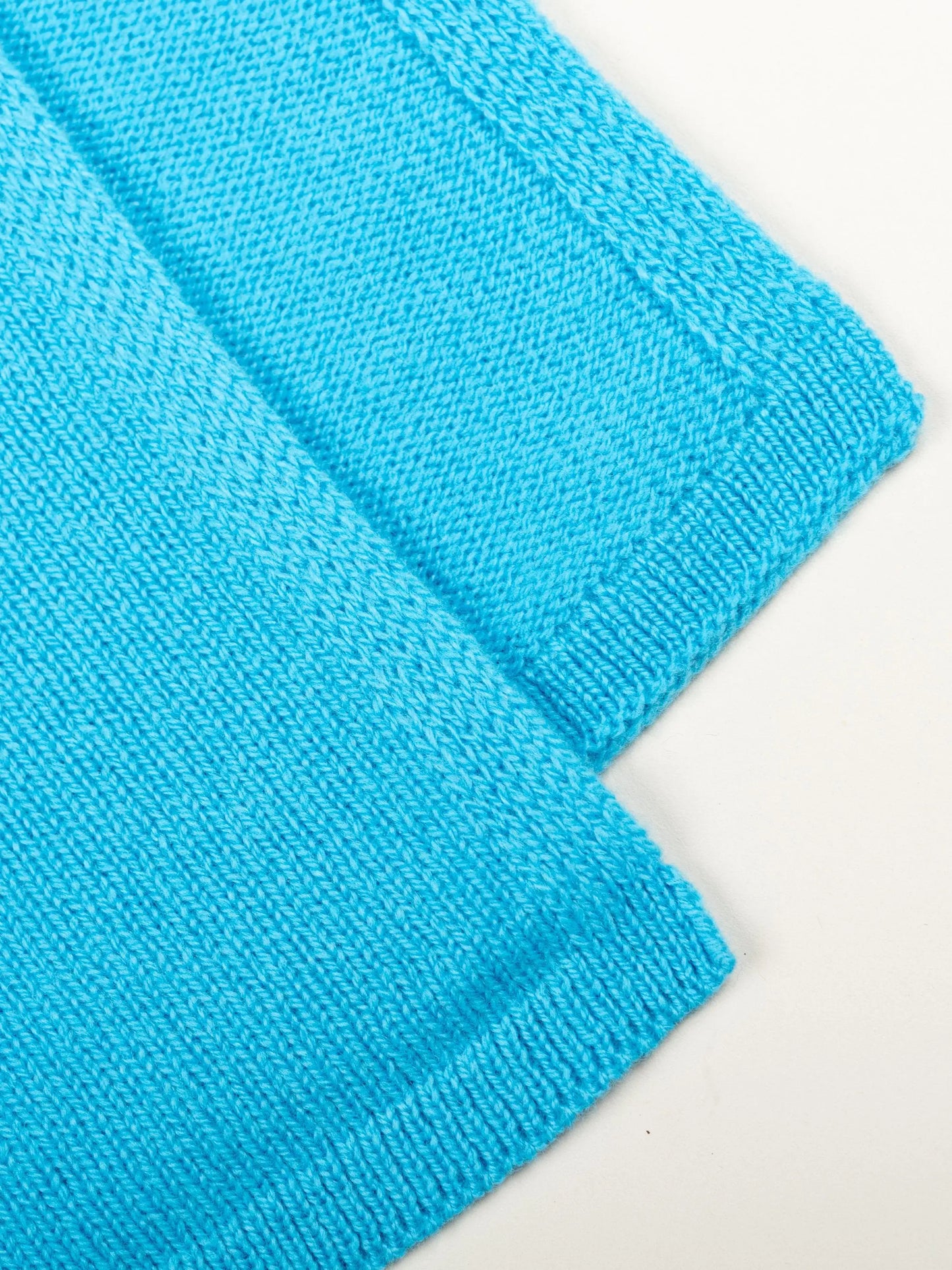 edging of a lightweight quality blue merino wool scarf - woolkind