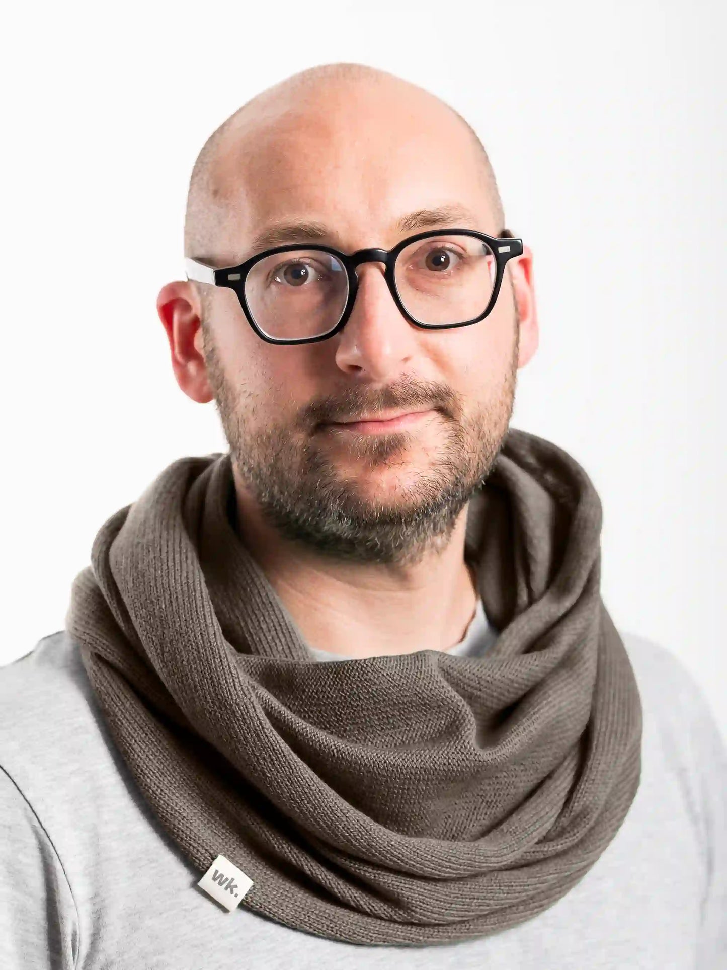 man wearing dark brown merino wool infinity scarf - Woolkind