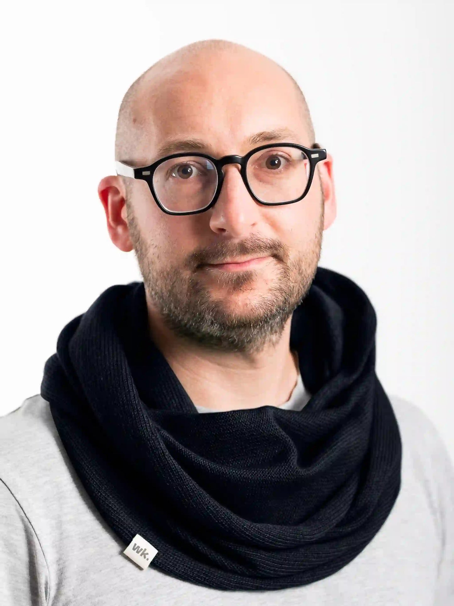 man wearing dark navy merino wool infinity scarf - Woolkind