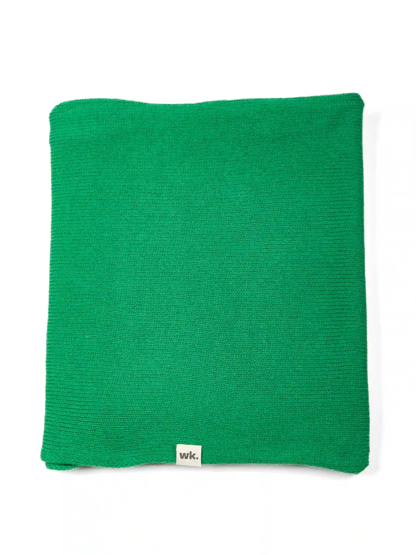 green merino wool infinity scarf flat lay - Woolkind