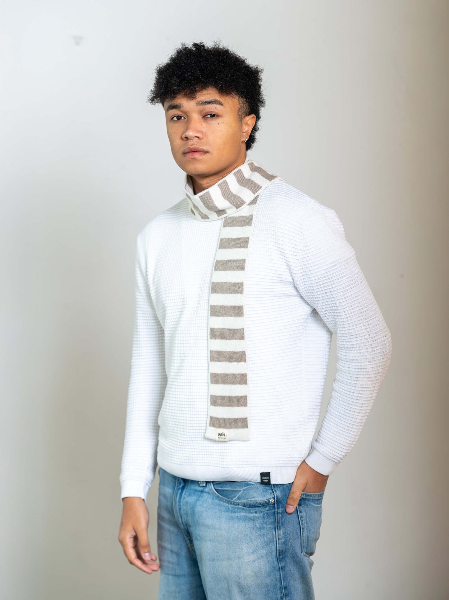 man wearing beige and cream skinny merino wool stripe scarf - Woolkind