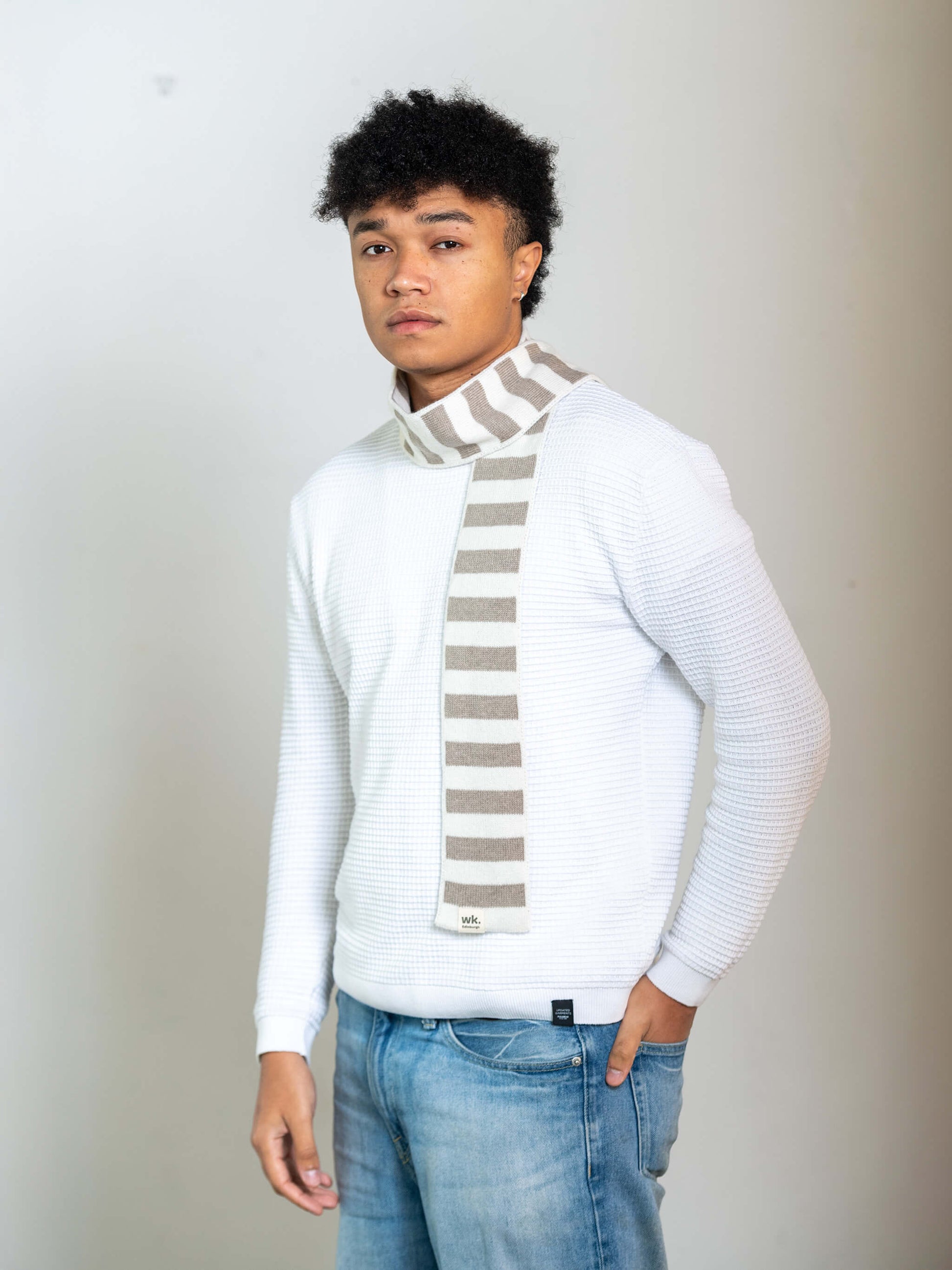 man wearing beige and cream skinny merino wool stripe scarf - Woolkind