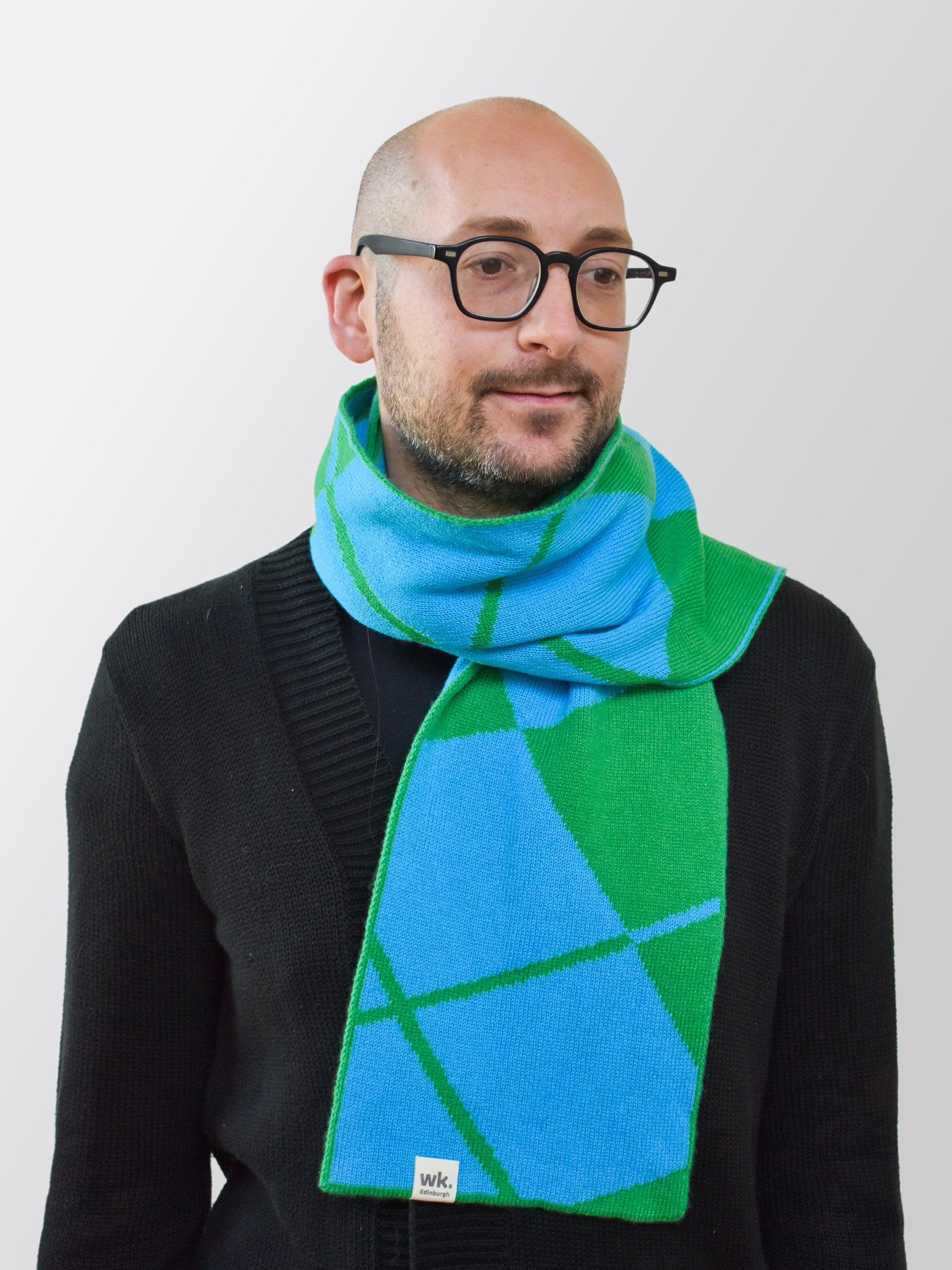 man wearing blue and green knitted argyle merino wool scarf - Woolkind