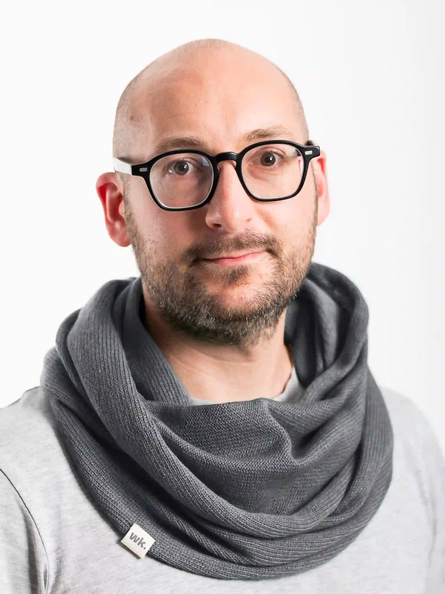 man wearing dark grey merino wool infinity scarf - Woolkind