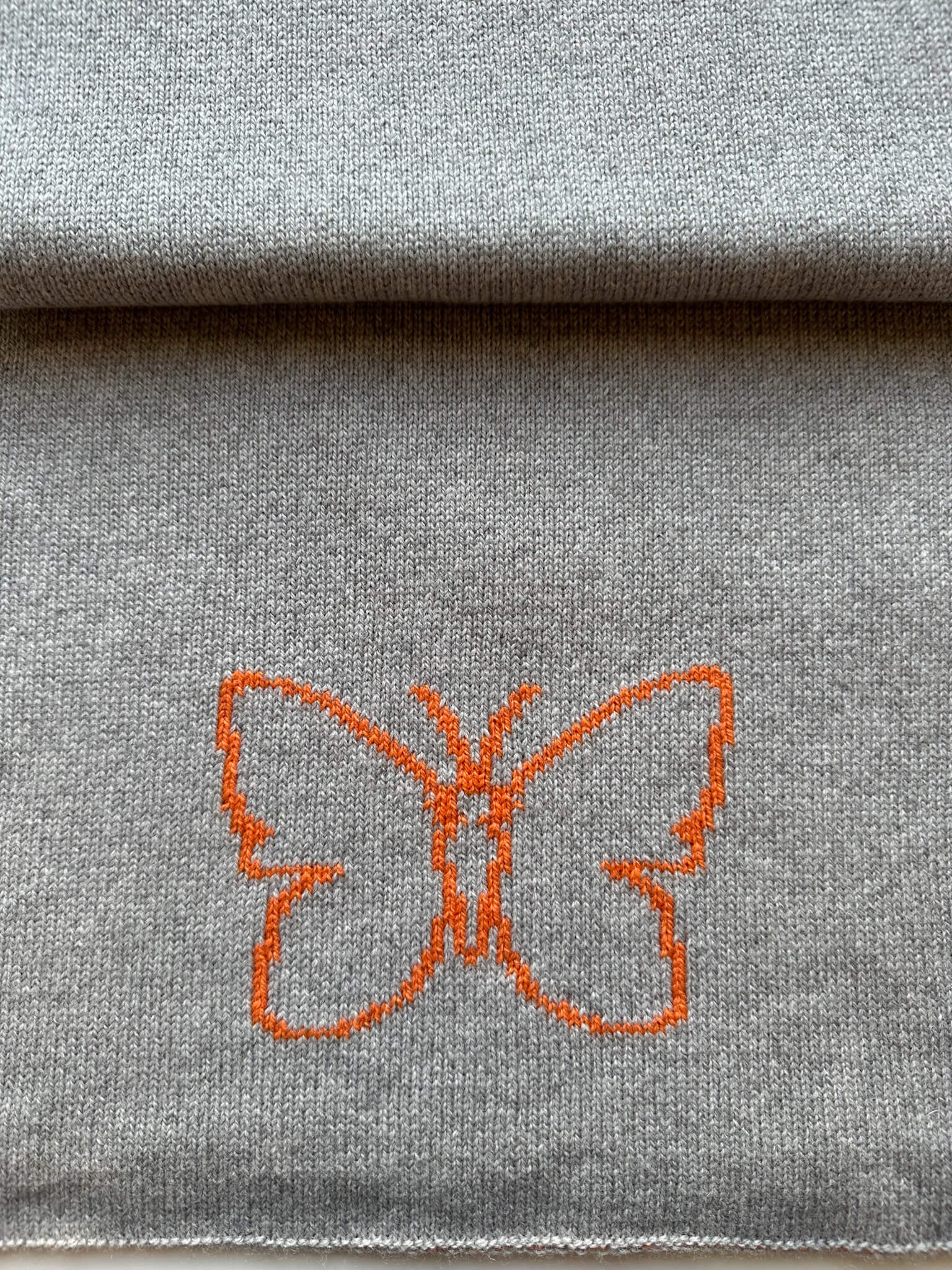 custom merino wool scarf with butterfly design in orange and light grey