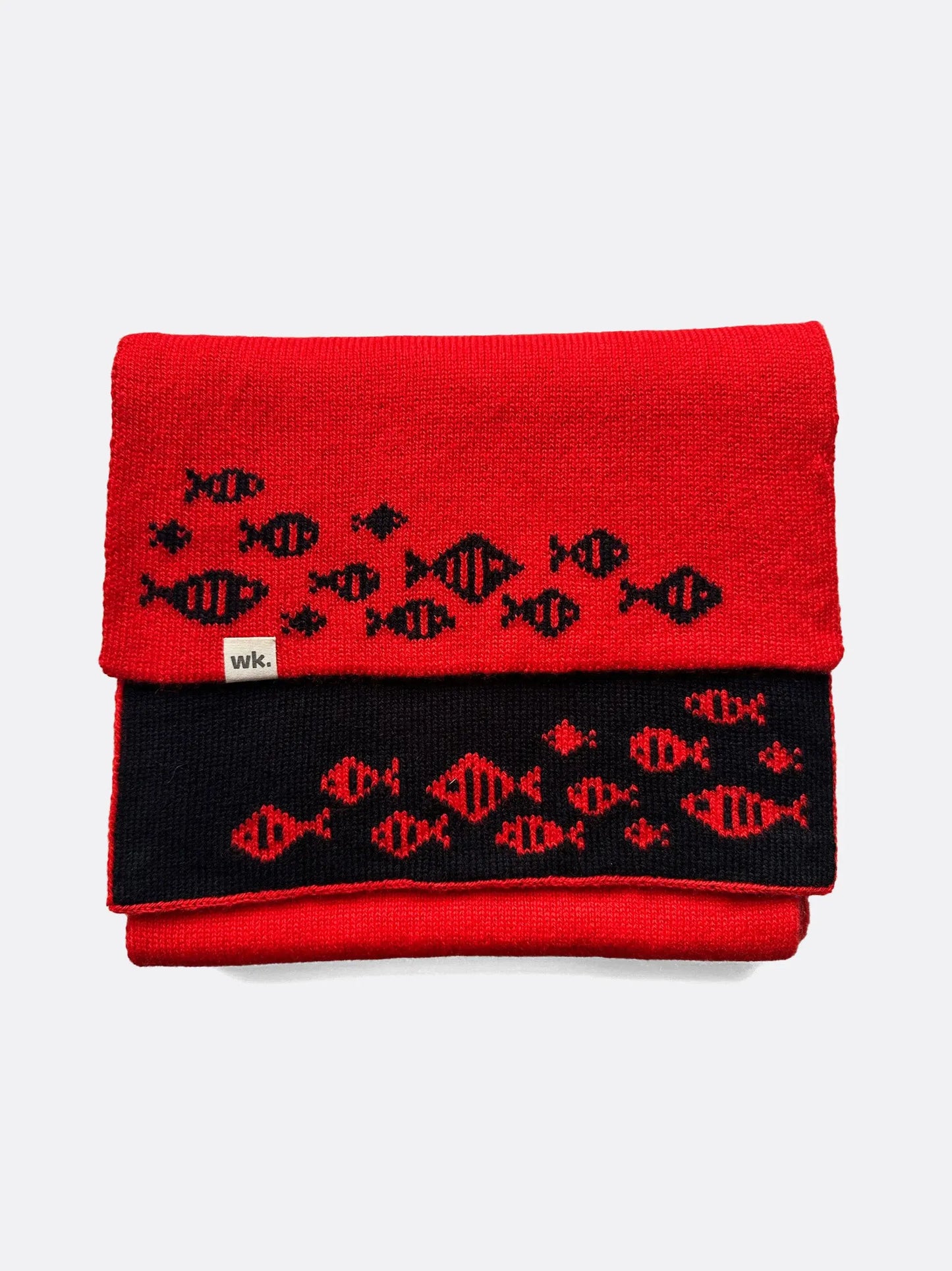 custom reversible merino wool scarf in red with dark navy fish at either end