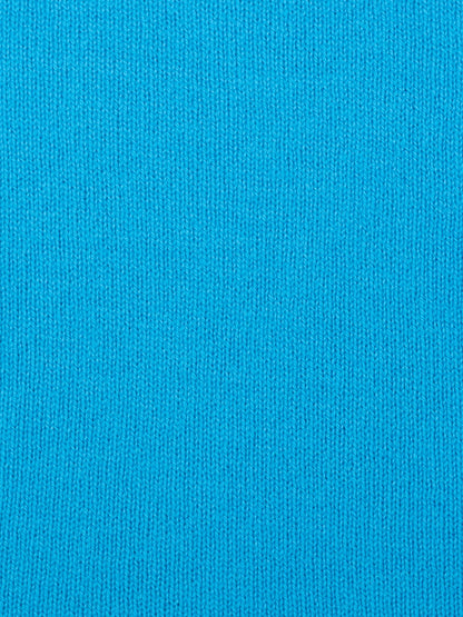 a swatch of plain single jersey knitting made from fine merino wool in a blue colour
