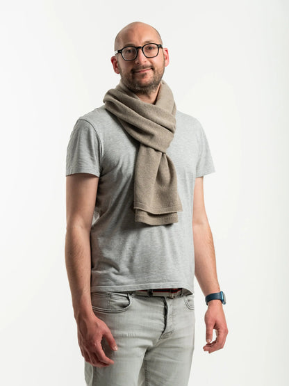 White man wearing a lightweight quality medium brown merino wool scarf - woolkind