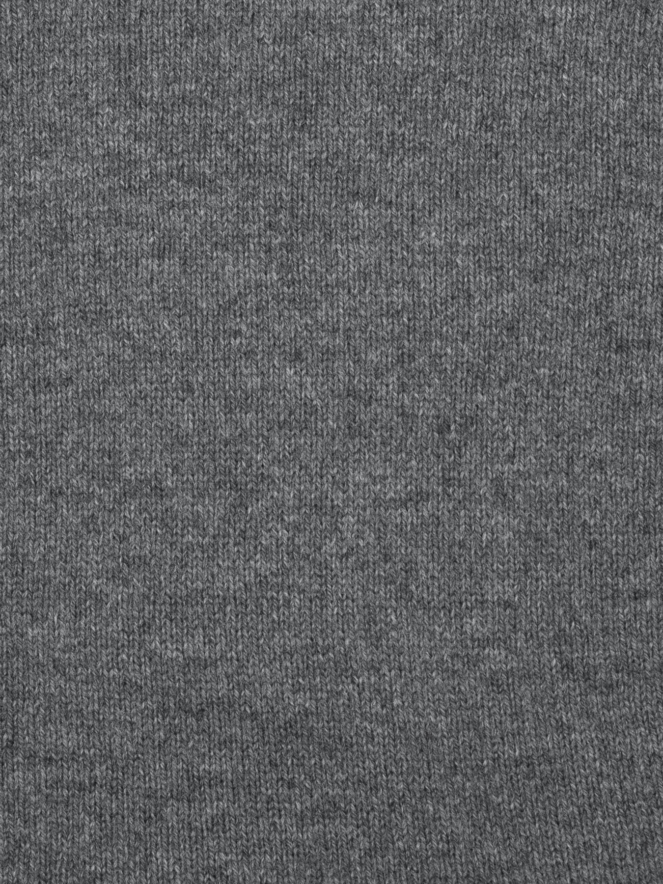 a swatch of plain single jersey knitting made from fine merino wool in a dark grey colour