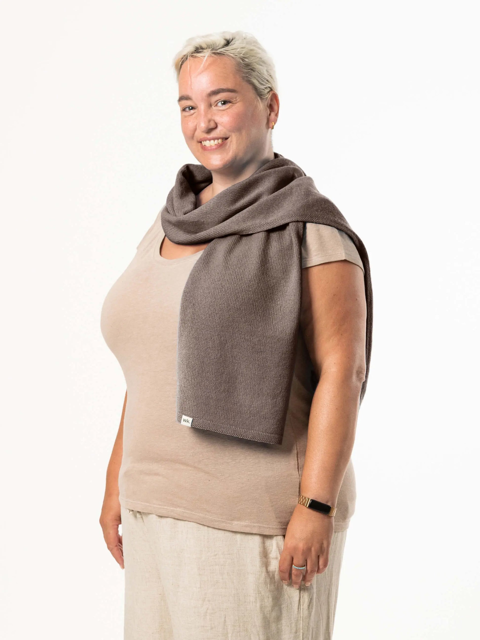 White woman wearing a lightweight quality dark brown merino wool scarf - woolkind