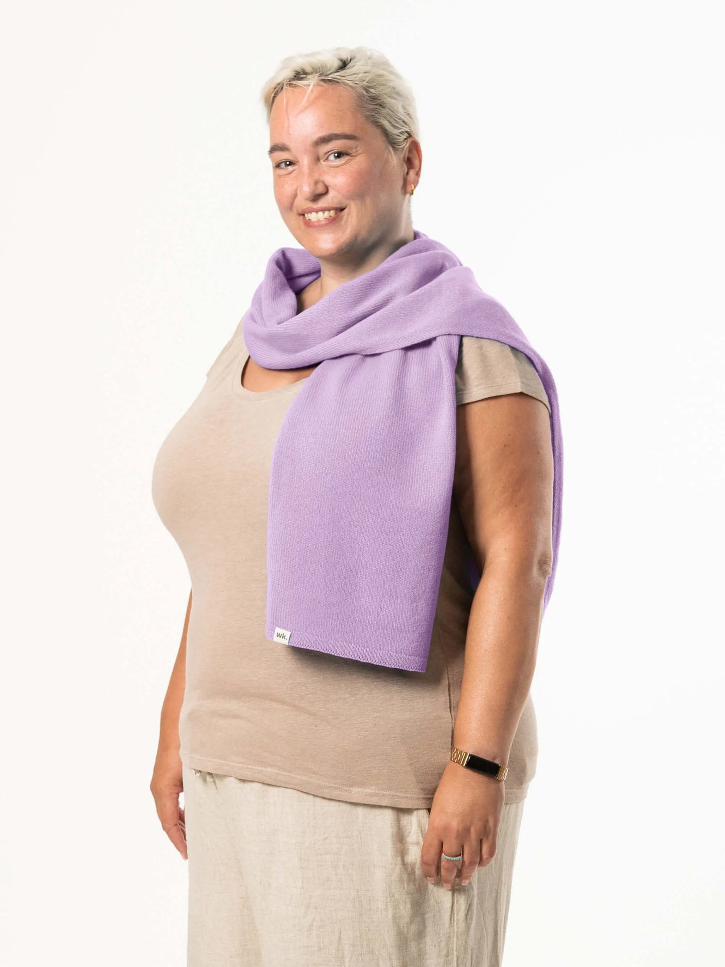 White woman wearing a lightweight quality lilac merino wool scarf - woolkind