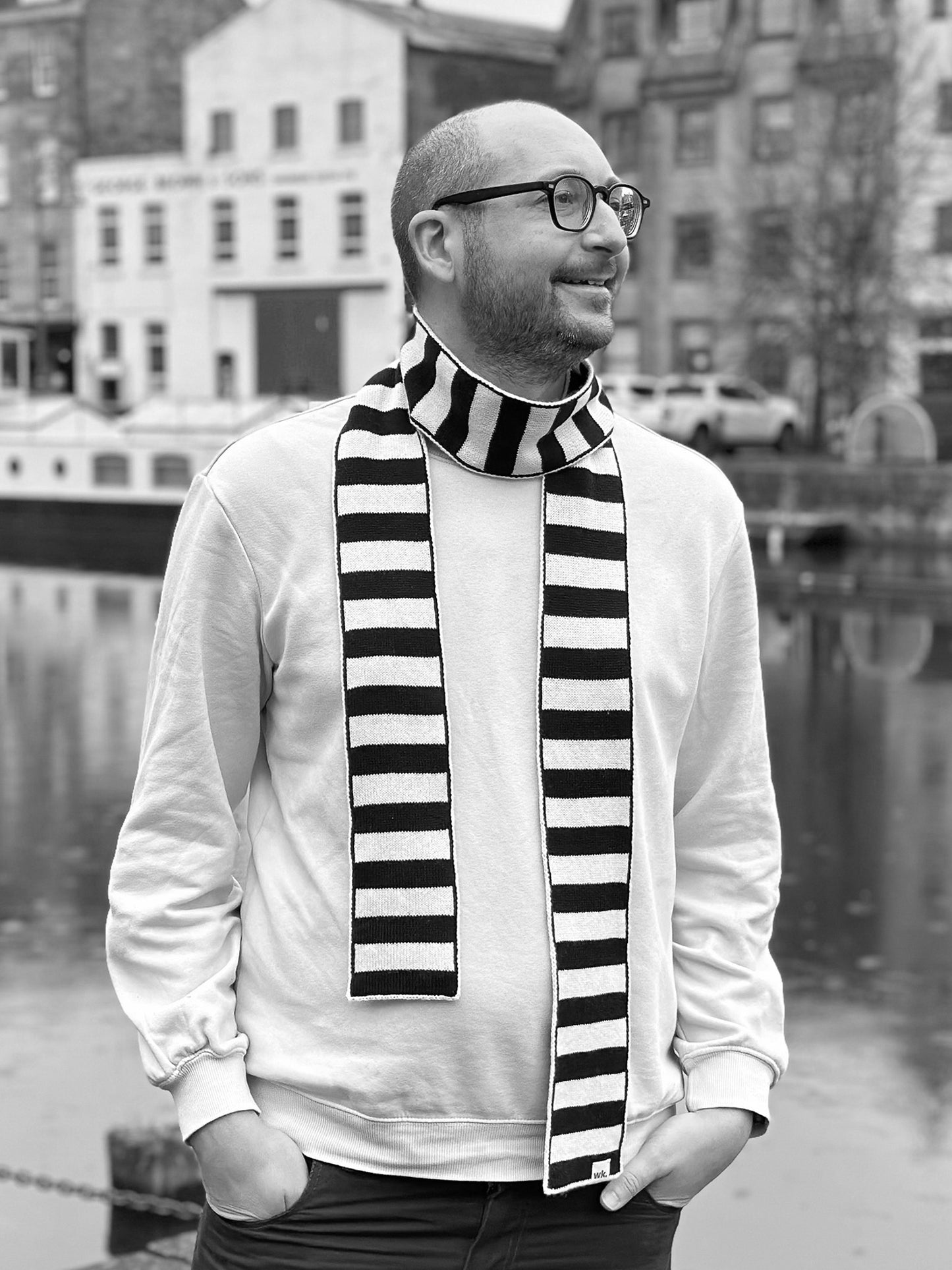 white man wearing knitted merino wool skinny narrow stripe scarf - woolkind