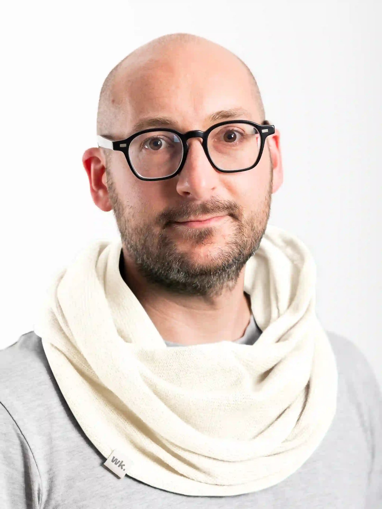 man wearing cream merino wool infinity scarf - Woolkind