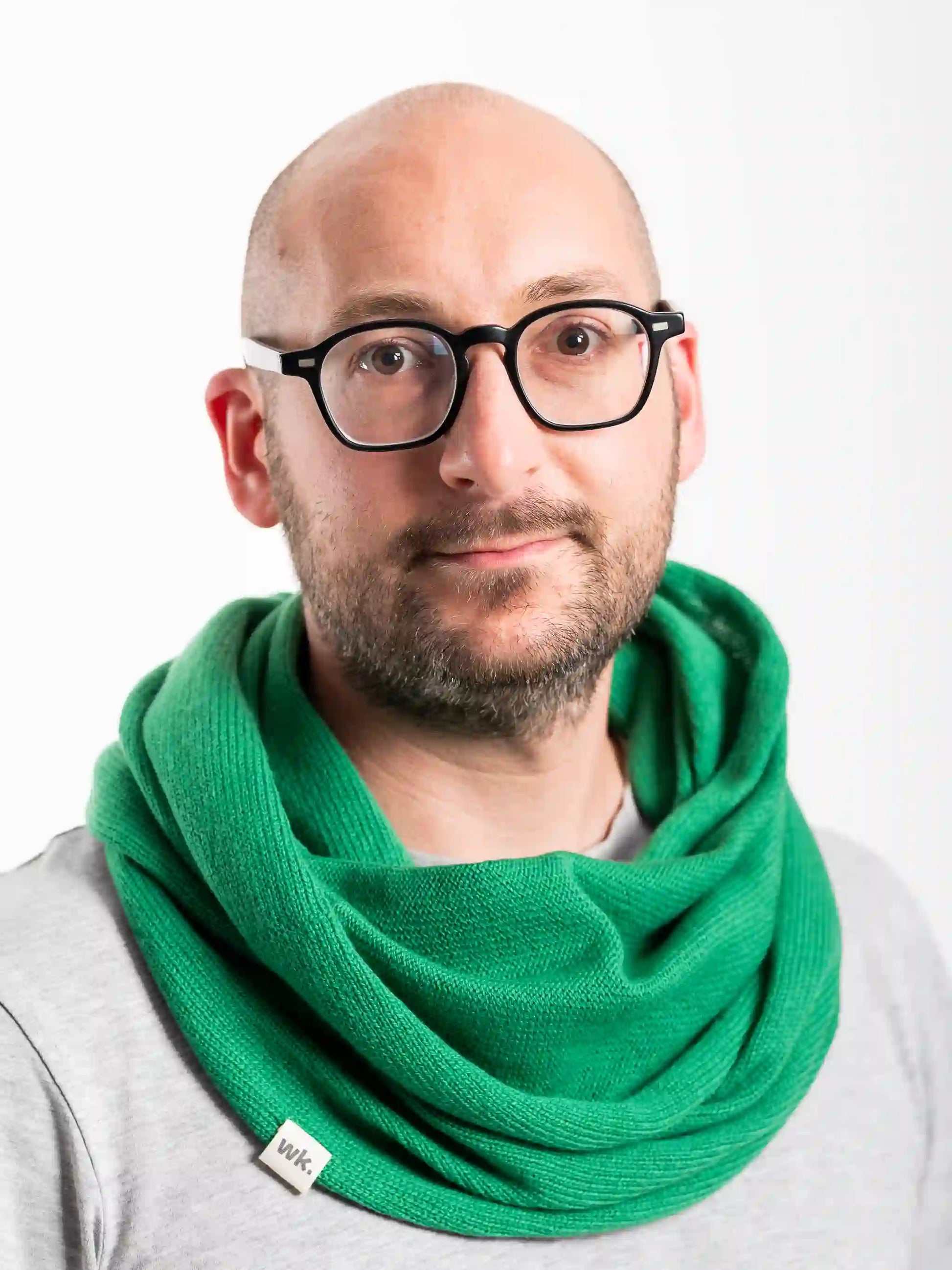 man wearing green merino wool infinity scarf - Woolkind