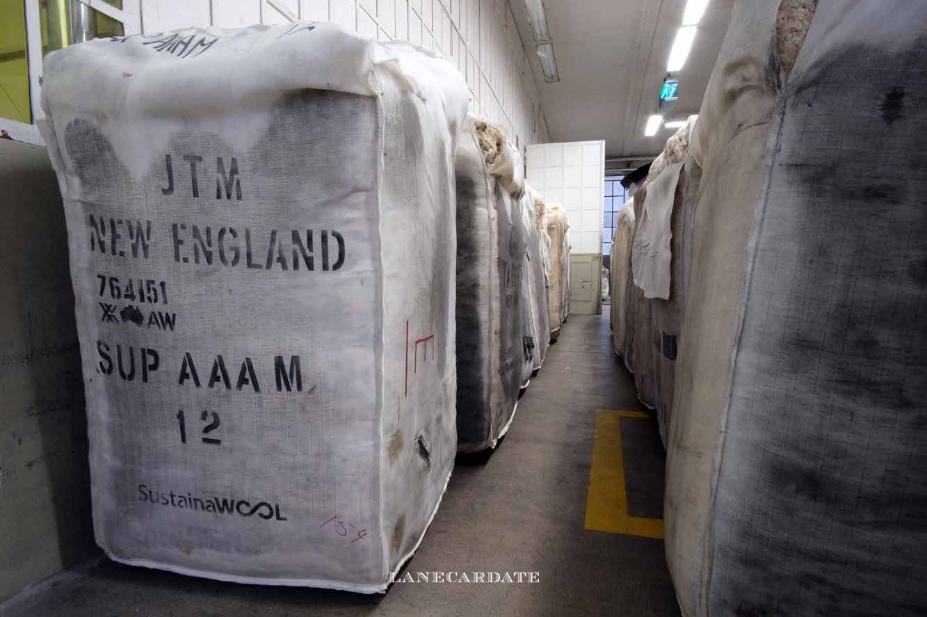 bales of wool in a lanecardate warehouse - woolkind