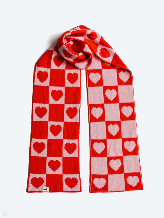 Merino wool Scarf with red and pink heart pattern on a white background