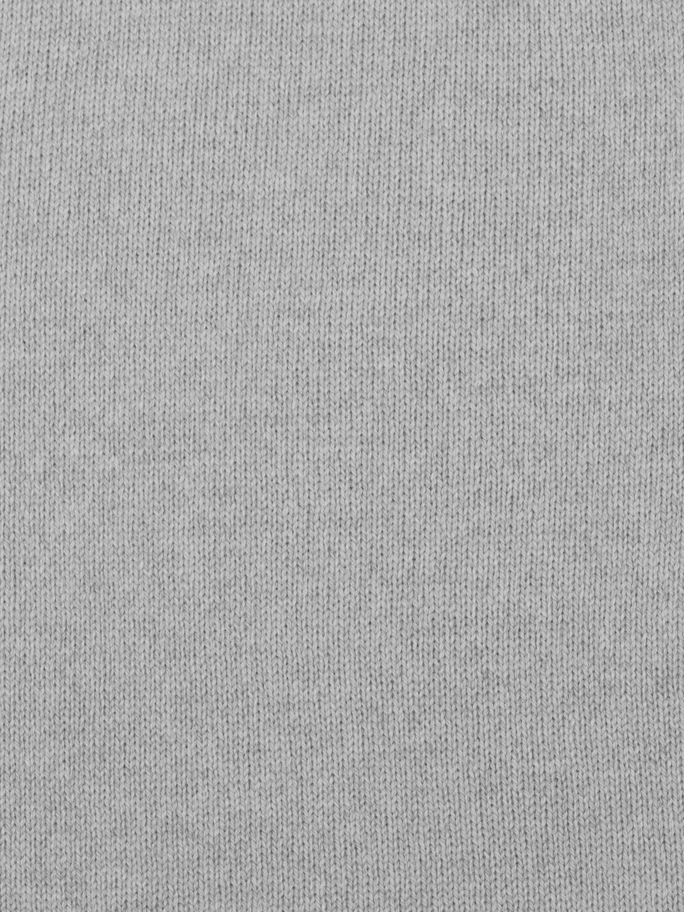 a swatch of plain single jersey knitting made from fine merino wool in a light grey colour