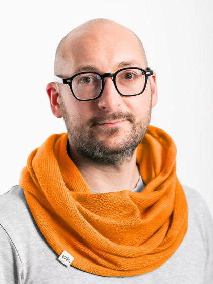 man wearing orange merino wool infinity scarf - Woolkind