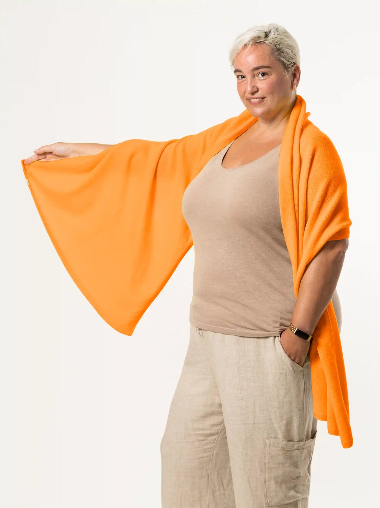 woman wearing orange merino wool wrap - woolkind