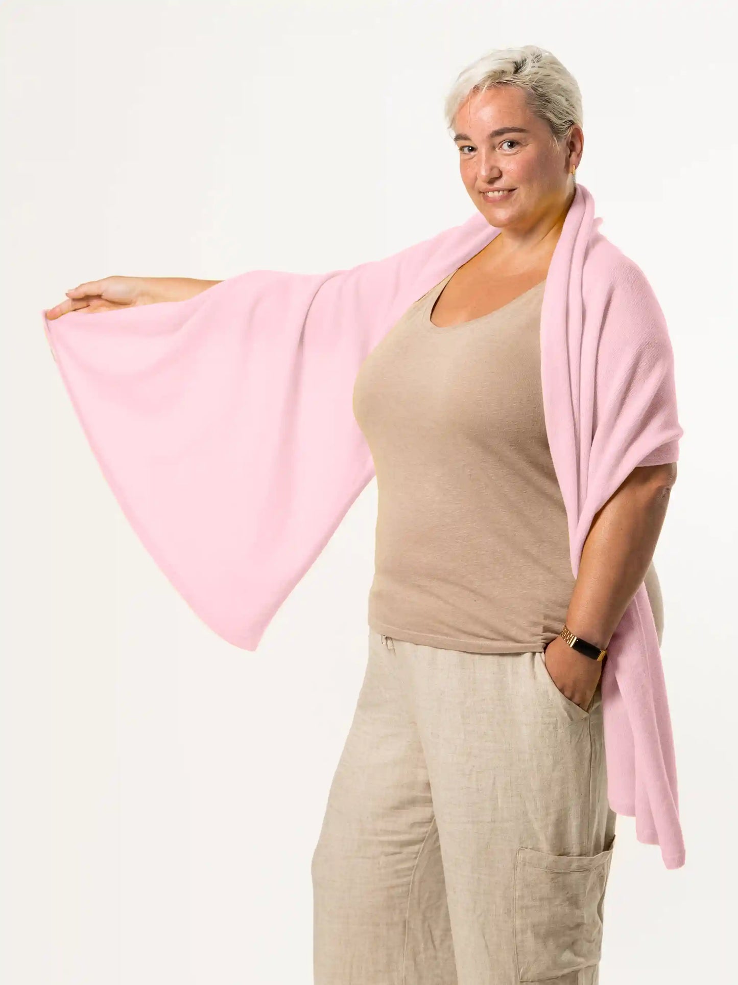woman wearing pink merino wool wrap - woolkind