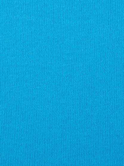 a swatch of plain single jersey knitting made from fine merino wool in a blue colour