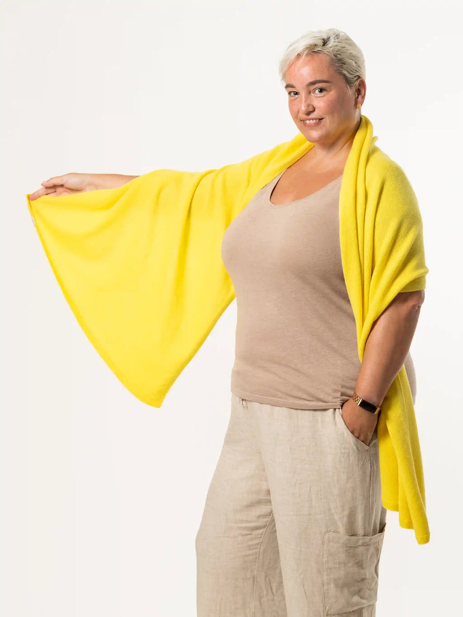 woman wearing yellow merino wool wrap - woolkind